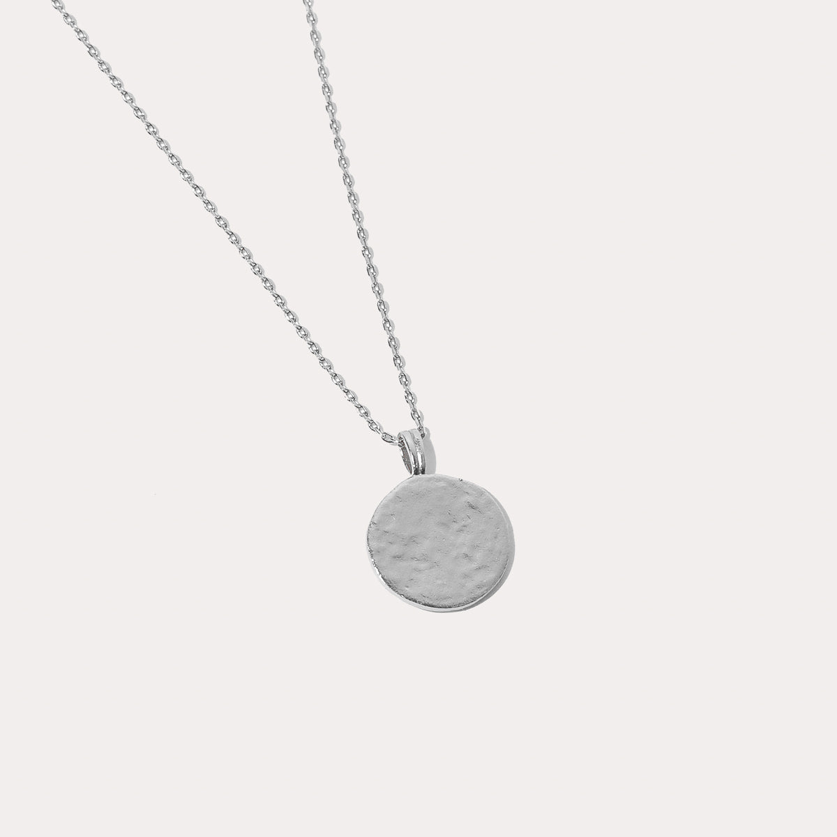 Close up shot of the back of the Gemini Zodiac Pendant Necklace in Silver