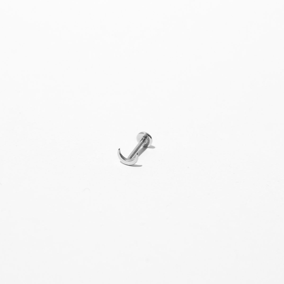 Moon Piercing Stud in Solid White Gold flat lay