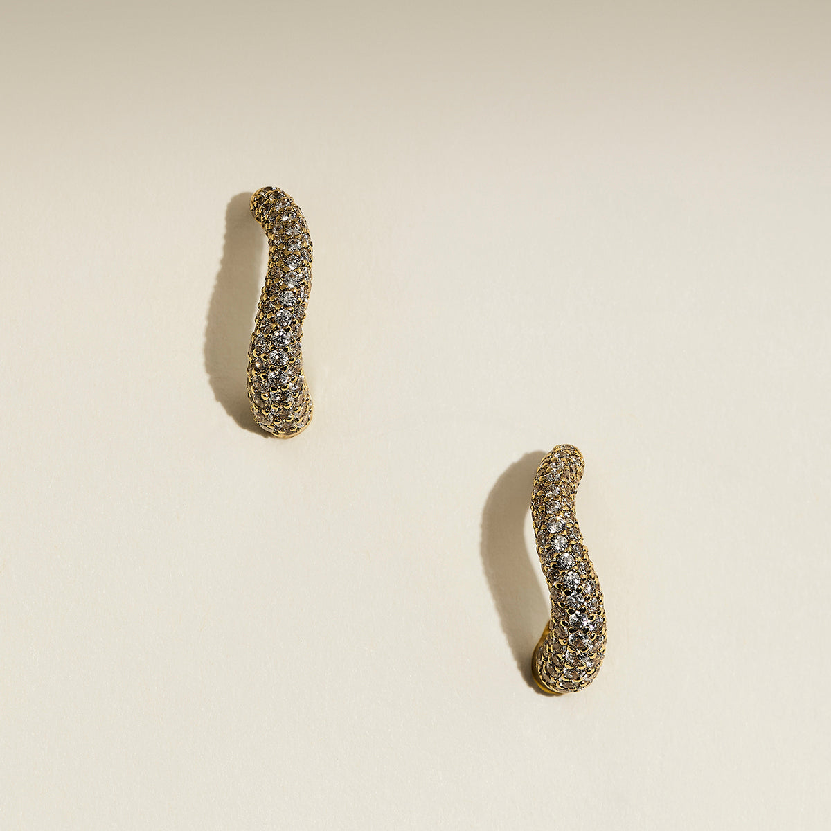 Wave Pavé Crystal Hoops in Gold-Astrid & Miyu