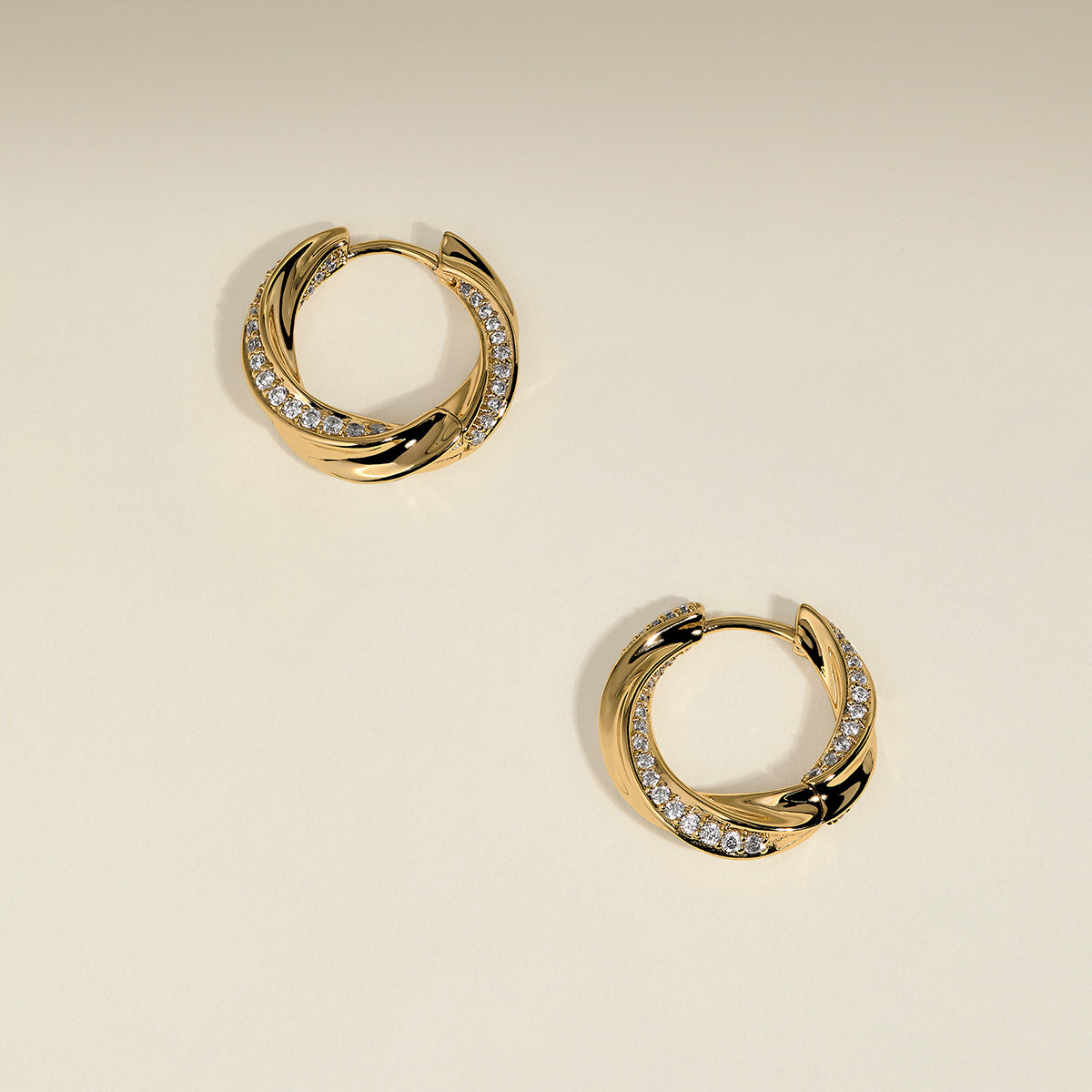 Crystal Cosmic Twist Medium Hoops in Gold-Astrid & Miyu