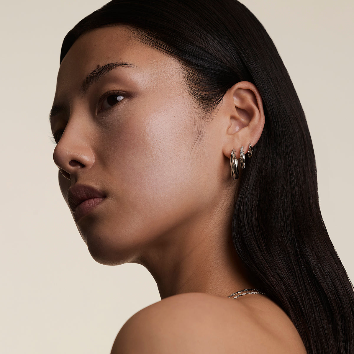 Crystal Cosmic Twist Medium Hoops in Silver-Astrid & Miyu