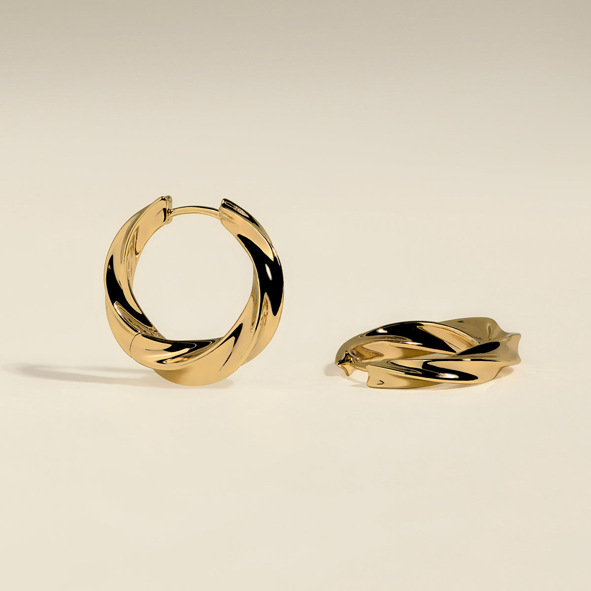 Cosmic Twist Large Hoops in Gold-Astrid & Miyu