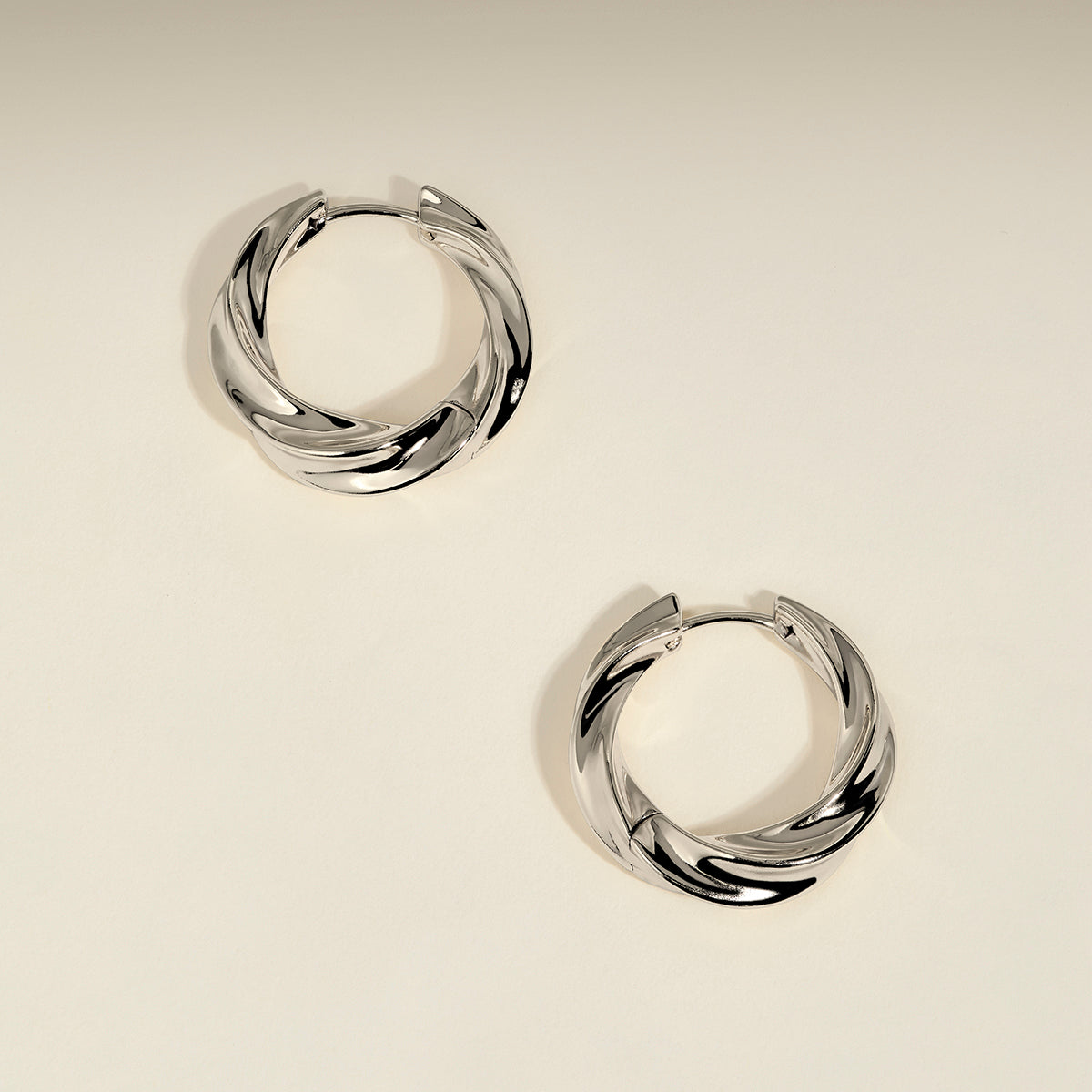 Cosmic Twist Large Hoops in Silver-Astrid & Miyu