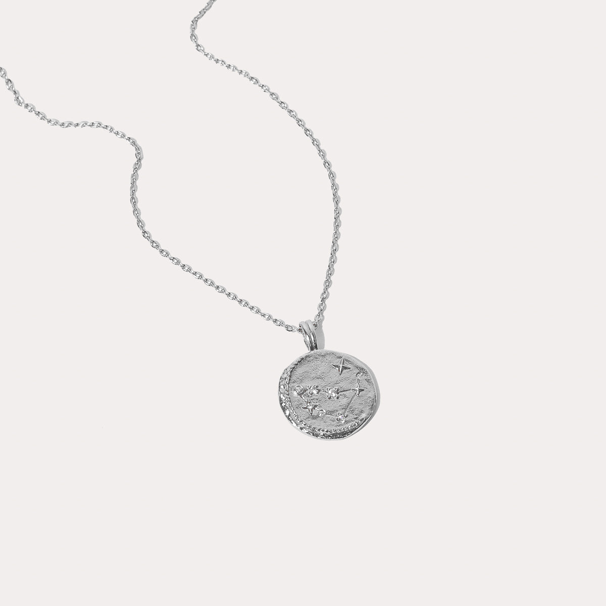 Close up shot of the front of the Capricorn Zodiac Pendant Necklace in Silver