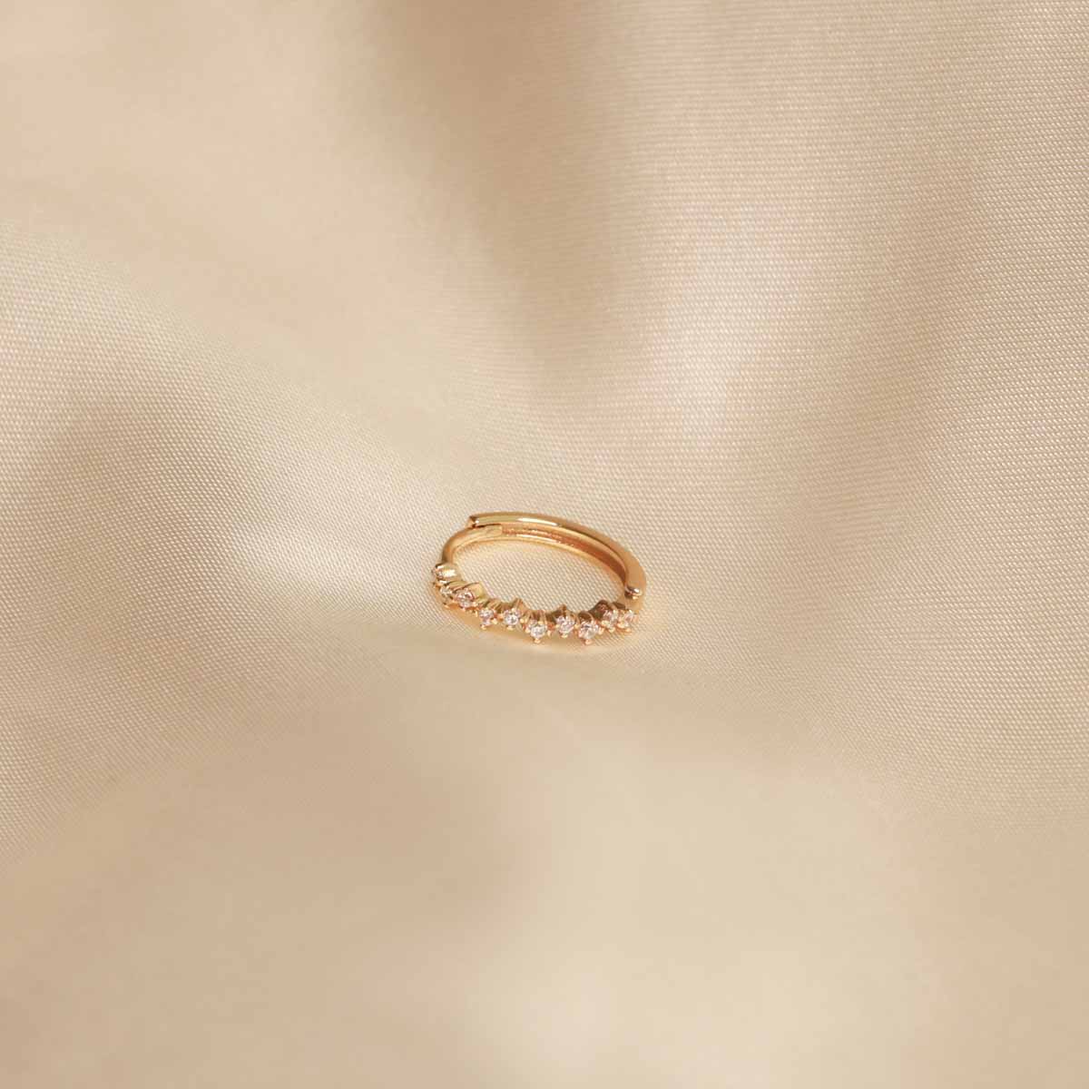 Flat lay of Cluster Hoop 11.5mm in Gold