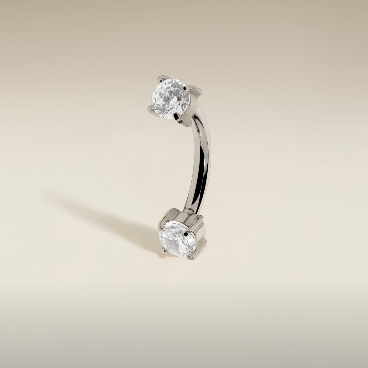 Worn shot of Rook Wave Gold Piercing Jewellery