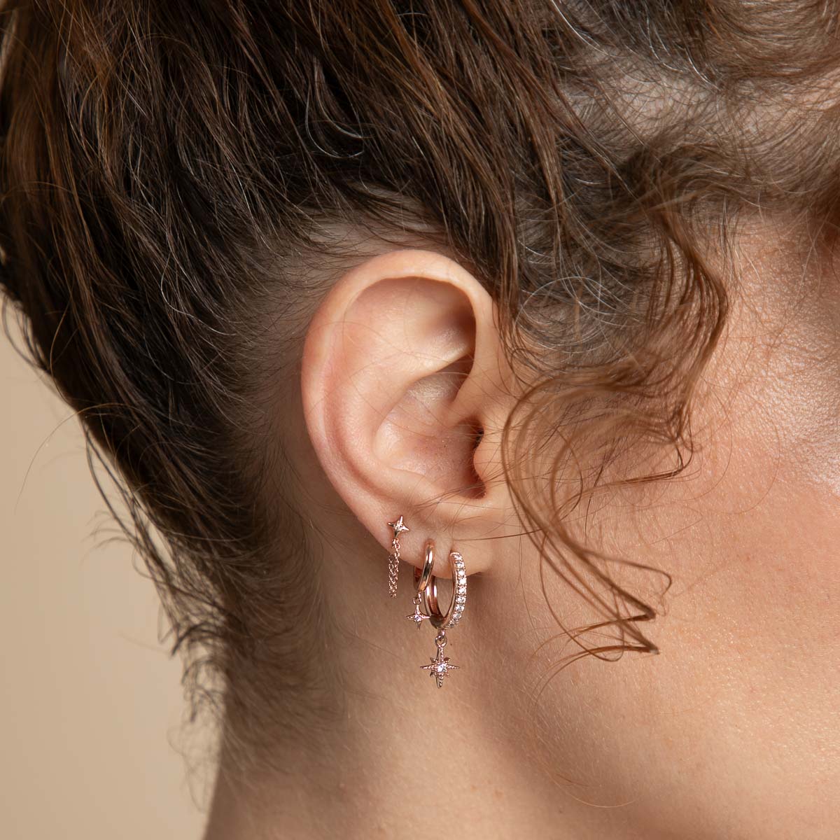 18k Rose Gold Plated Jewellery - Cosmic Star Charm Huggies in Rose Gold - Huggies - Astrid &amp; Miyu