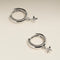 Cosmic Star Charm Huggies in Silver-Astrid &amp; Miyu
