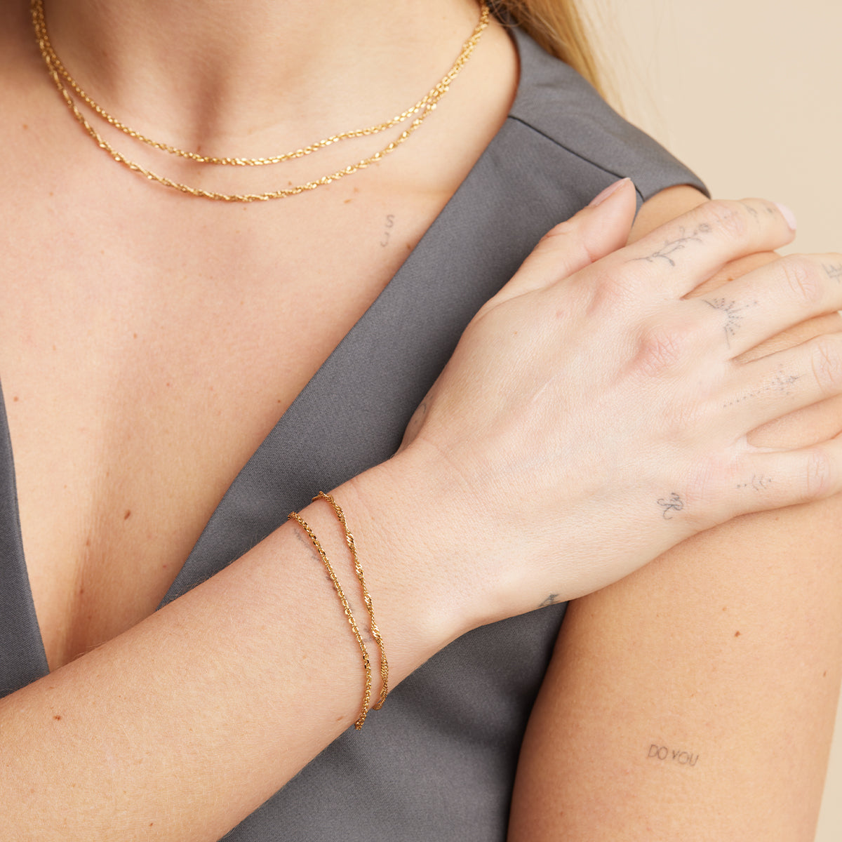 18k Gold Plated Jewellery - Illusion Twist Double Chain Bracelet in Gold - Chain Bracelet - Astrid &amp; Miyu