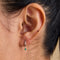 Earrings - Emerald Pear Charm Huggies in Solid White Gold - Huggies - Astrid &amp; Miyu