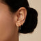 Earrings - Alexandrite Charm Twist Huggies in Solid Gold - Huggies - Astrid &amp; Miyu