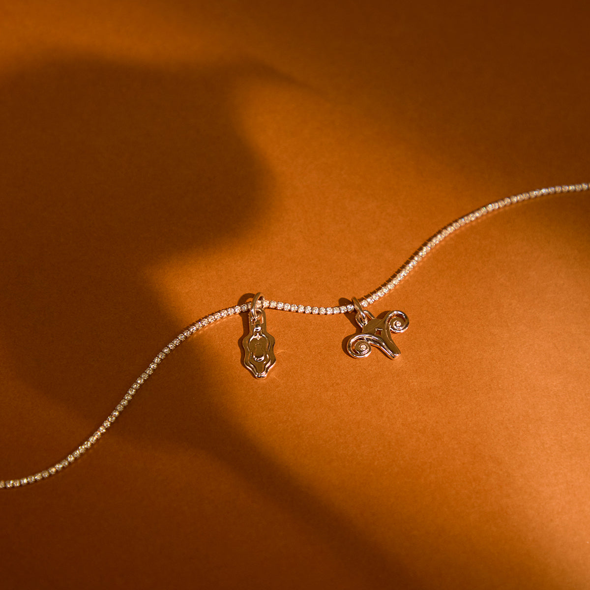 A&M x Hertility Uterus Charm in Gold-Astrid &amp; Miyu
