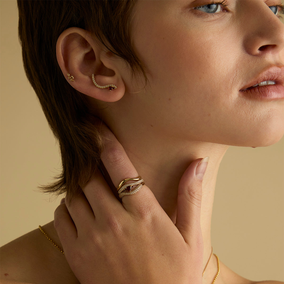 18k Gold Plated Jewellery - Garnet Serpent Wave Ring in Gold - Band Rings - Astrid &amp; Miyu