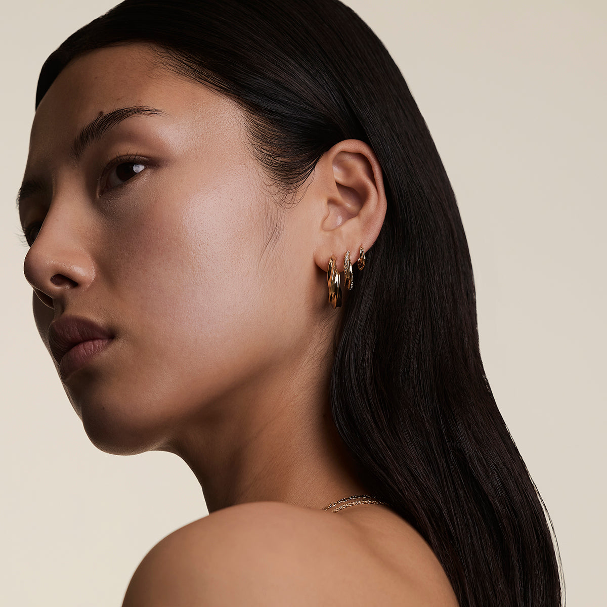 Crystal Cosmic Twist Medium Hoops in Gold-Astrid &amp; Miyu