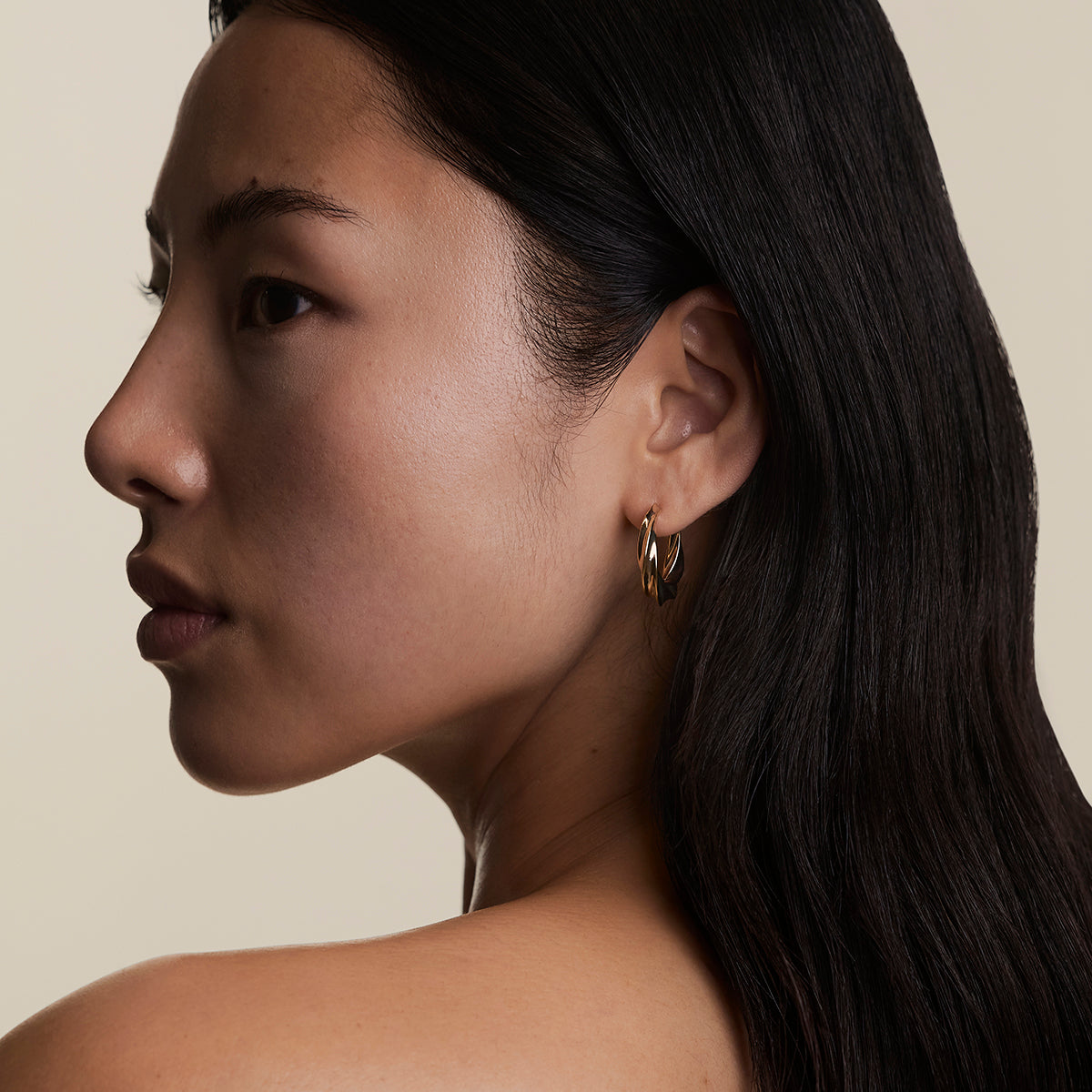 Cosmic Twist Large Hoops in Gold-Astrid &amp; Miyu