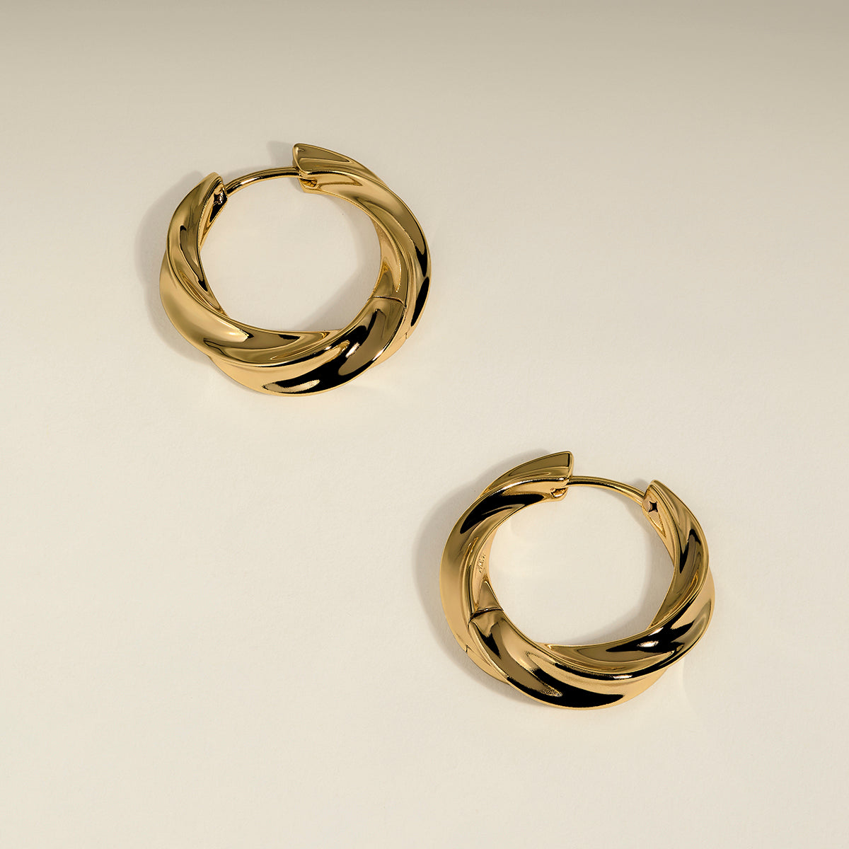 Cosmic Twist Large Hoops in Gold-Astrid &amp; Miyu