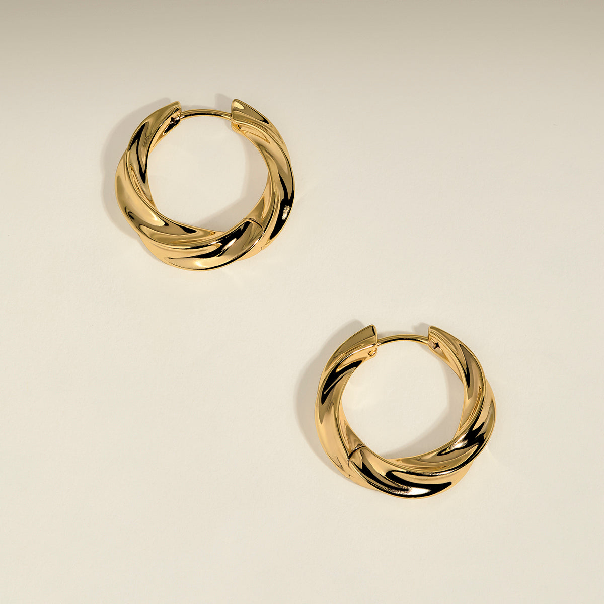 Cosmic Twist Large Hoops in Gold-Astrid &amp; Miyu