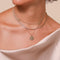 Leo Zodiac Pendant Necklace in Gold worn layered with necklaces