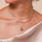 Sagittarius Zodiac Pendant Necklace in Gold worn layered with necklaces