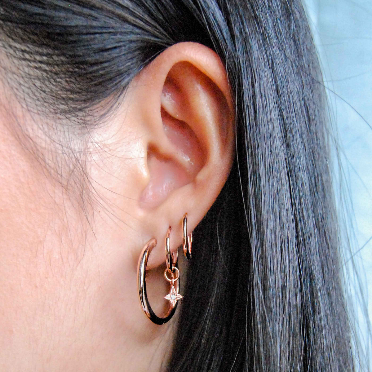 Simple Hinge Hoops in Rose Gold worn shot