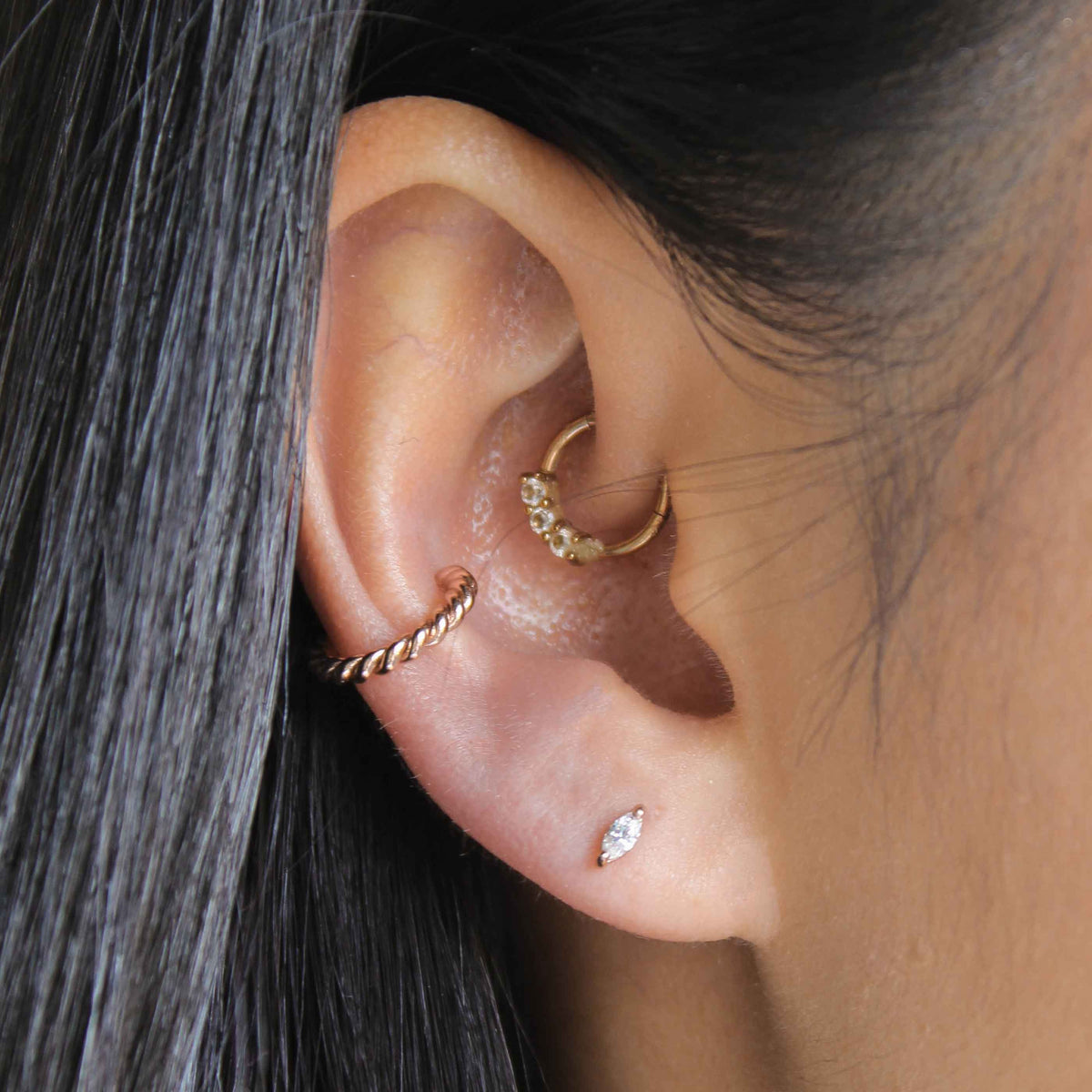 Navette Stud Earrings in Rose Gold worn with rose gold ear cuff