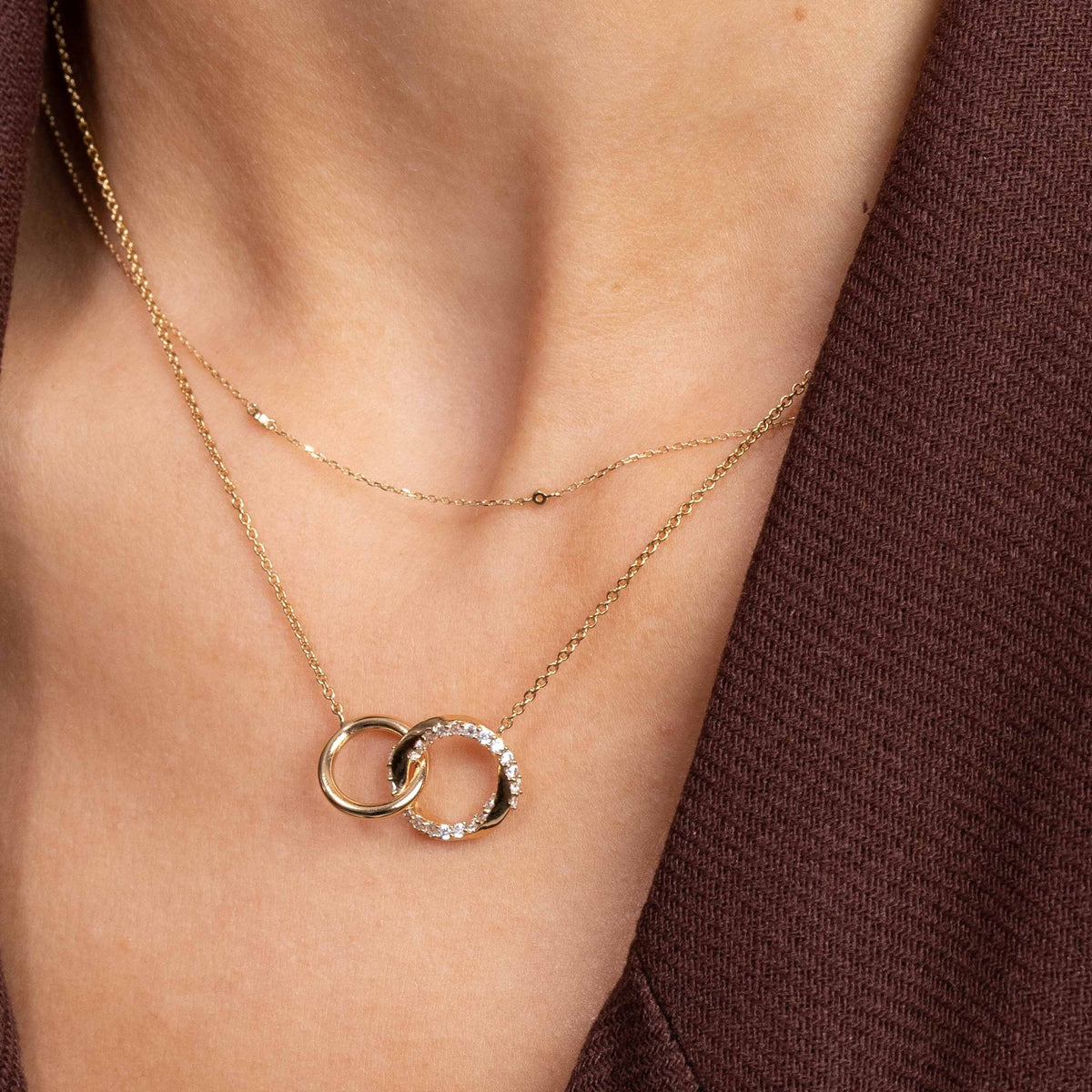 Topaz Charm Necklace in Solid Gold worn layered with Orbit Crystal Necklace in Gold