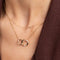 Topaz Charm Necklace in Solid Gold worn layered with Orbit Crystal Necklace in Gold