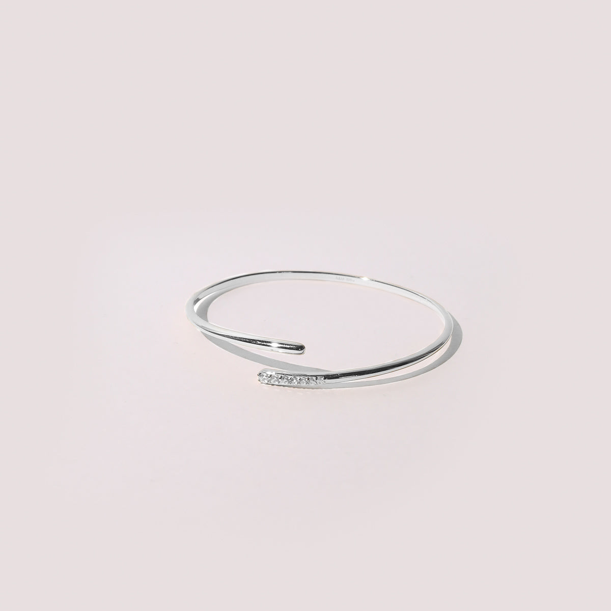 Orbit Crystal Cuff in Silver flat lay shot