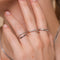 Orbit Crystal Ring in Silver worn with other rings