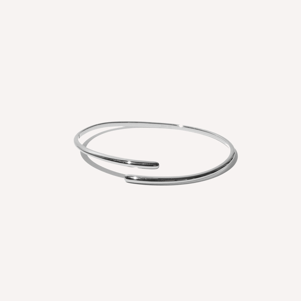 Twist Cuff in Silver flat lay