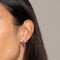 Charm Crystal Huggies in Silver worn with other earrings