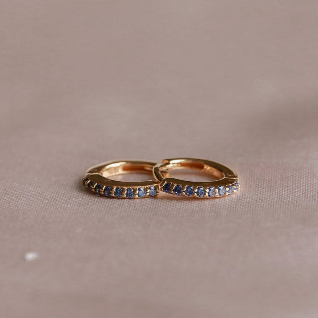 18k Gold Plated Jewellery - September Birthstone Huggies in Gold with Sapphire CZ - Huggies - Astrid &amp; Miyu