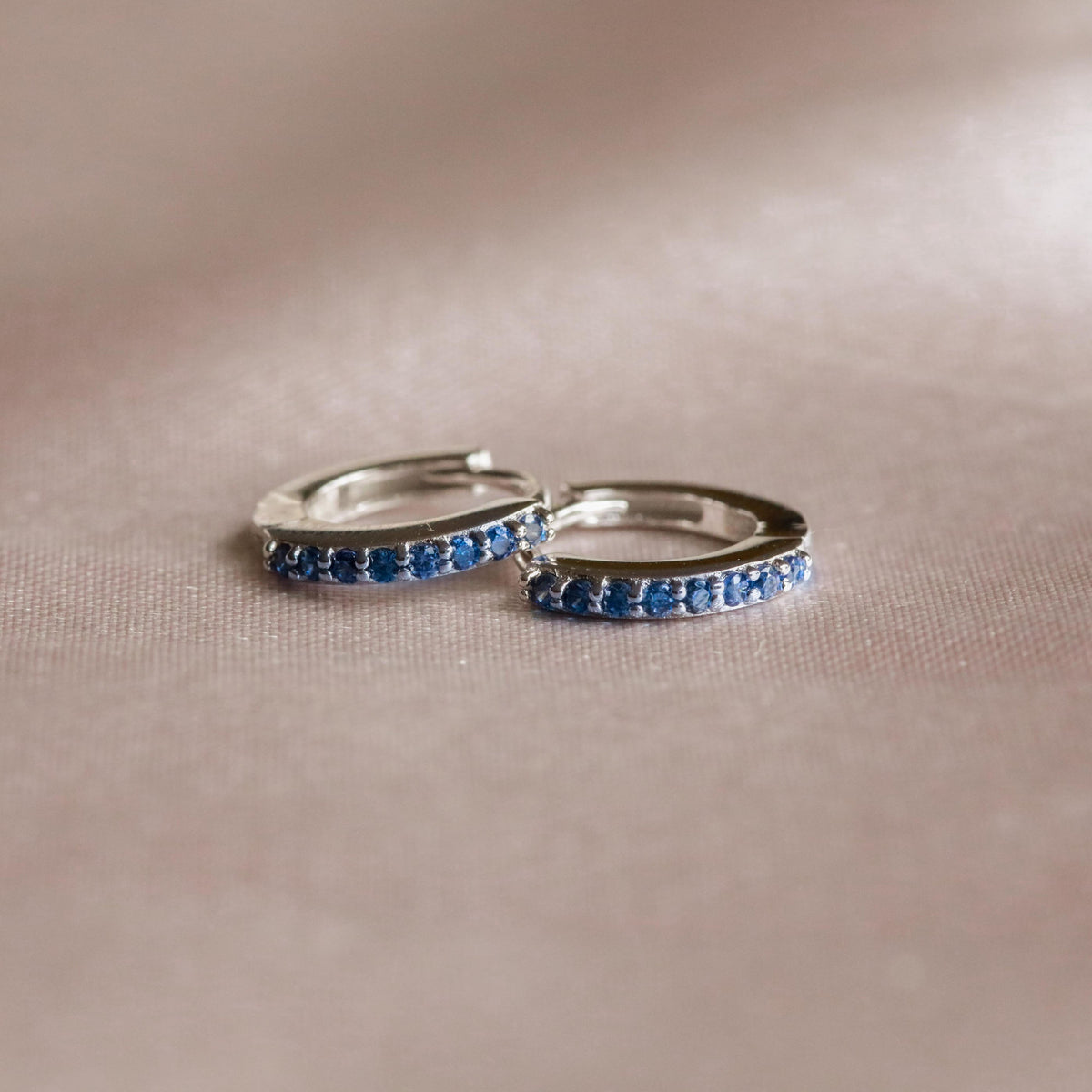 Birthstone Earrings - September Birthstone Huggies in Silver with Sapphire CZ - Huggies - Astrid &amp; Miyu